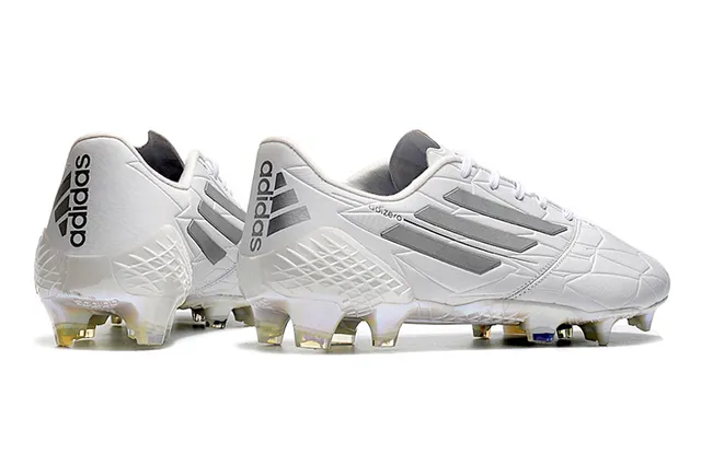 Adidas adizero Chaussures de football blanches argentées holographiques pour terrain ferme 24
