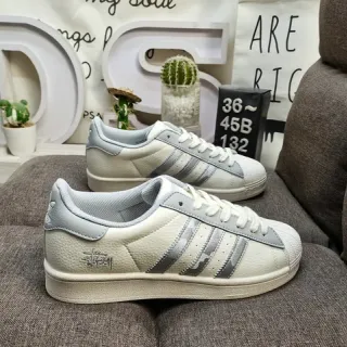 Adidas Superstar Stussy Collaboration Off-White and Gray Lifestyle Sneakers