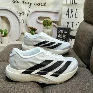Adidas Chaussures de course blanches noires en maille légère avec trois rayures sur le côté de branding