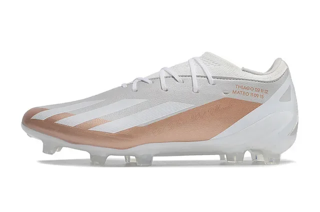 Adidas X Chaussures de football blanc et or low-cut upper synthétique panel accent métallique rose sol ferme 7