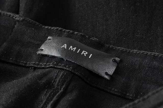 Amiri কালো ও সাদা distressed Logo-Print জিন্স 9