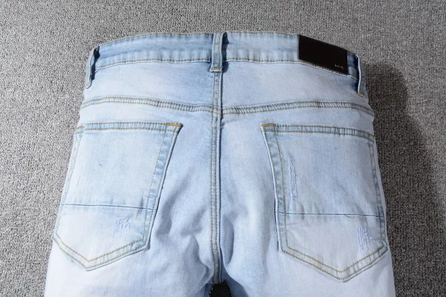 Jeans Amiri patchwork distressed light-wash slim-fit 5