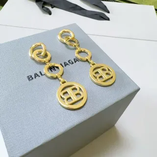 Balenciaga BB llavero dorado gris metal logo circular encanto aretes