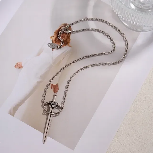 Balenciaga Collier Pendentif Épée Argent et Or 4
