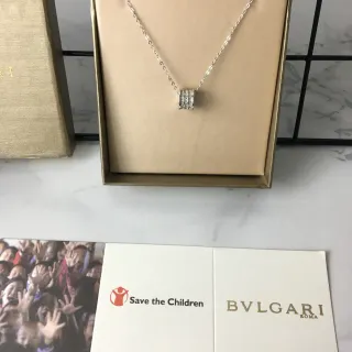 Bvlgari चाँदी-सोना की गोलाकार बहु-बैंड पेंडेंट पावे-सेट स्टोन नेकलेस