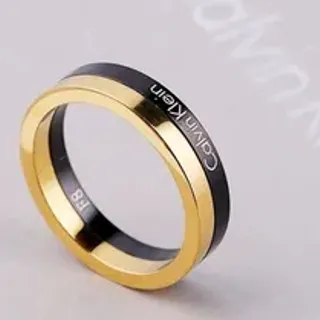 Calvin Klein Two-Tone Engraved Gold and Black Ring