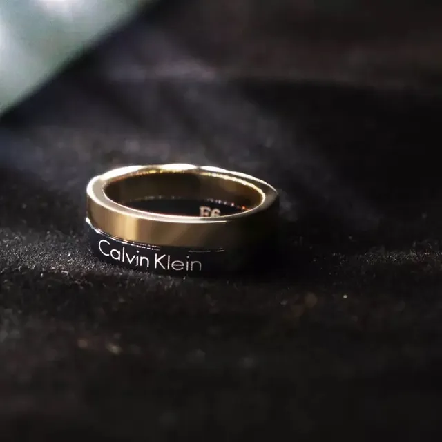 Calvin Klein Two-Tone Engraved Gold and Black Ring 3