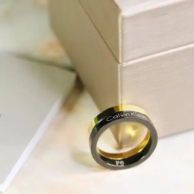 Calvin Klein Two-Tone Engraved Gold and Black Ring 5