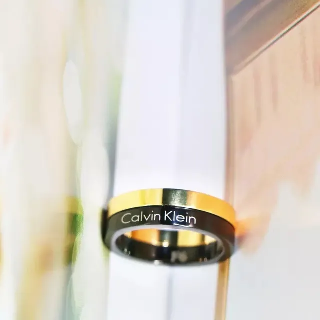 Calvin Klein Two-Tone Engraved Gold and Black Ring 6