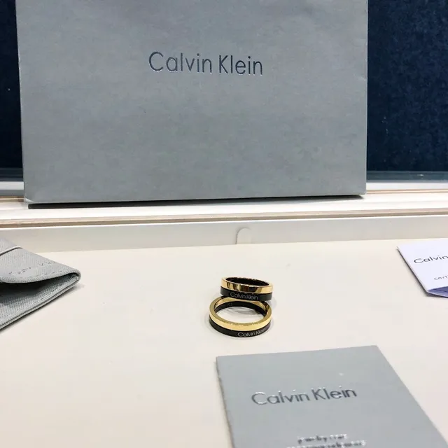 Calvin Klein Two-Tone Engraved Gold and Black Ring 7