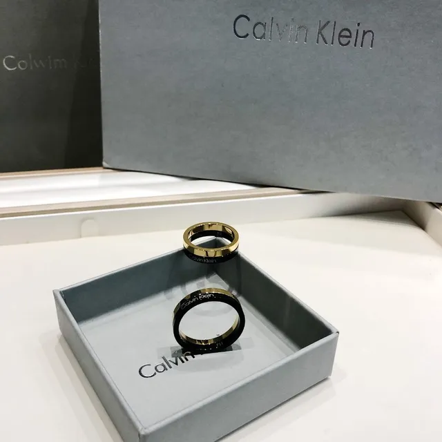 Calvin Klein Two-Tone Engraved Gold and Black Ring 8