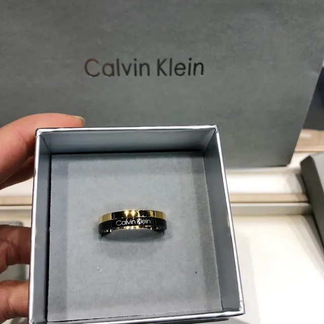 Calvin Klein Two-Tone Engraved Gold and Black Ring 9
