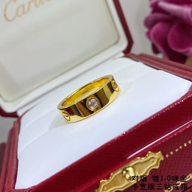Anillo Cartier de oro y plata con banda plana ancha y piedra redonda central única 3