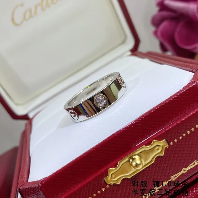 Anillo Cartier de oro y plata con banda plana ancha y piedra redonda central única 4