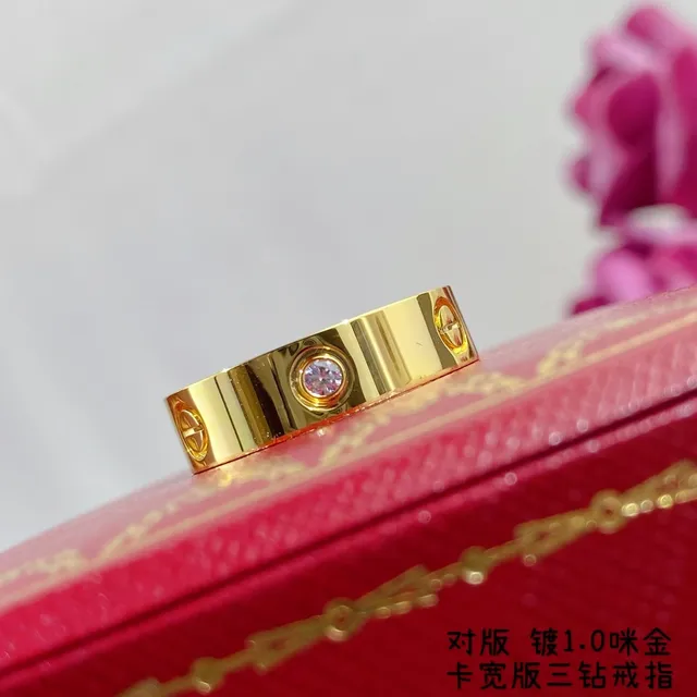 Anillo Cartier de oro y plata con banda plana ancha y piedra redonda central única 7