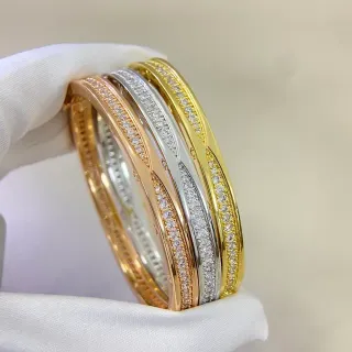 Cartier Juste un Clou Pavé Tricolor Gold Interlocking Bangle Bracelets