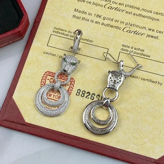 Boucles d'oreilles Cartier Panthère Tête de Panthère Pavé Diamants Œil Vert 2