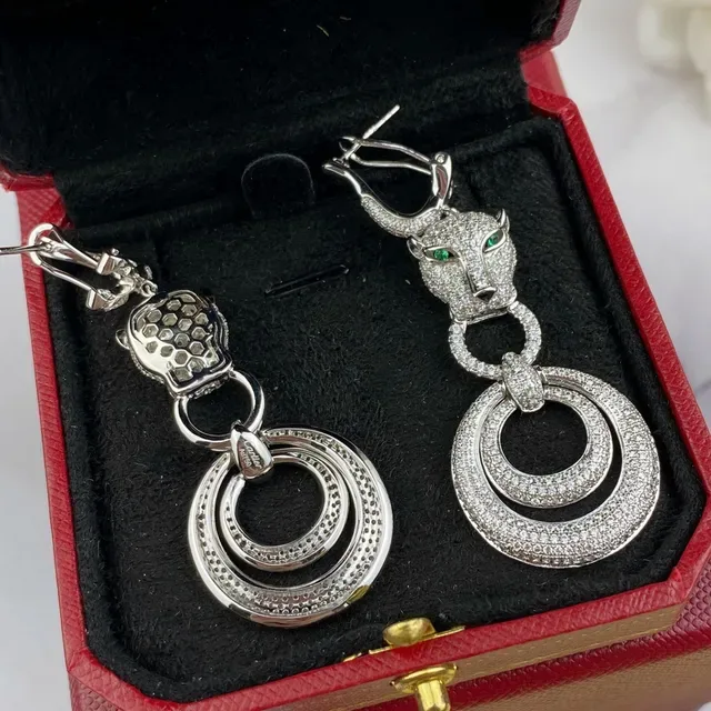 Boucles d'oreilles Cartier Panthère Tête de Panthère Pavé Diamants Œil Vert 5