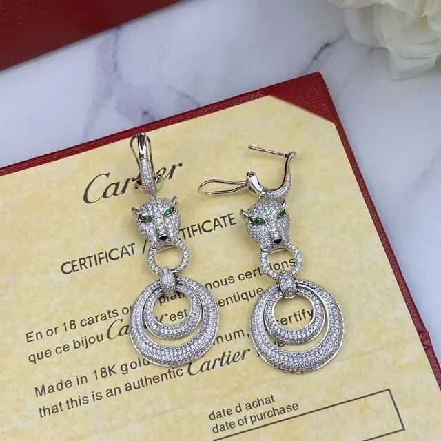 Boucles d'oreilles Cartier Panthère Tête de Panthère Pavé Diamants Œil Vert 6