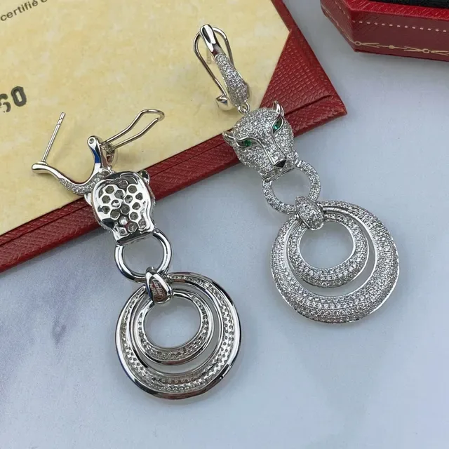 Boucles d'oreilles Cartier Panthère Tête de Panthère Pavé Diamants Œil Vert 7