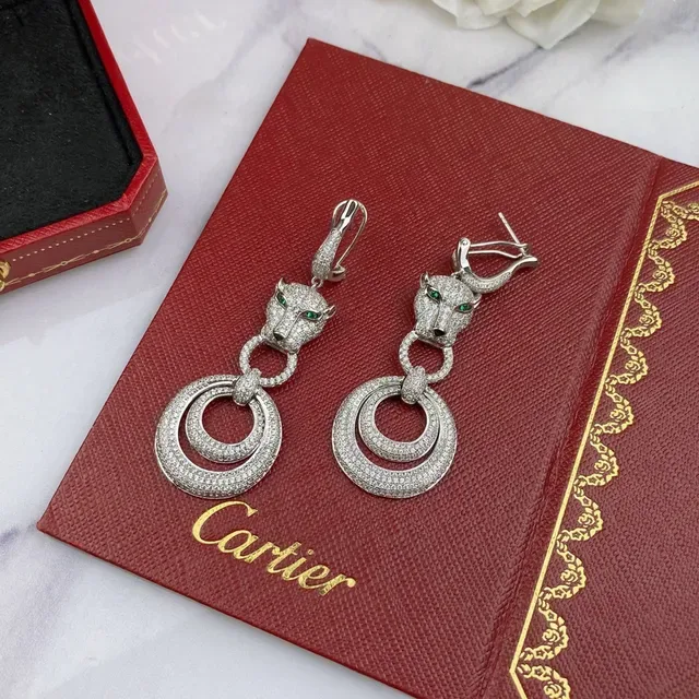 Boucles d'oreilles Cartier Panthère Tête de Panthère Pavé Diamants Œil Vert 8