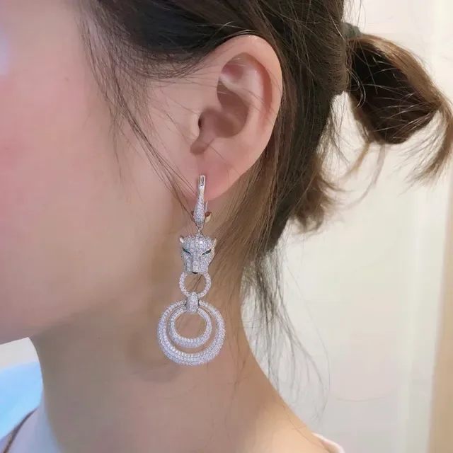 Boucles d'oreilles Cartier Panthère Tête de Panthère Pavé Diamants Œil Vert 9