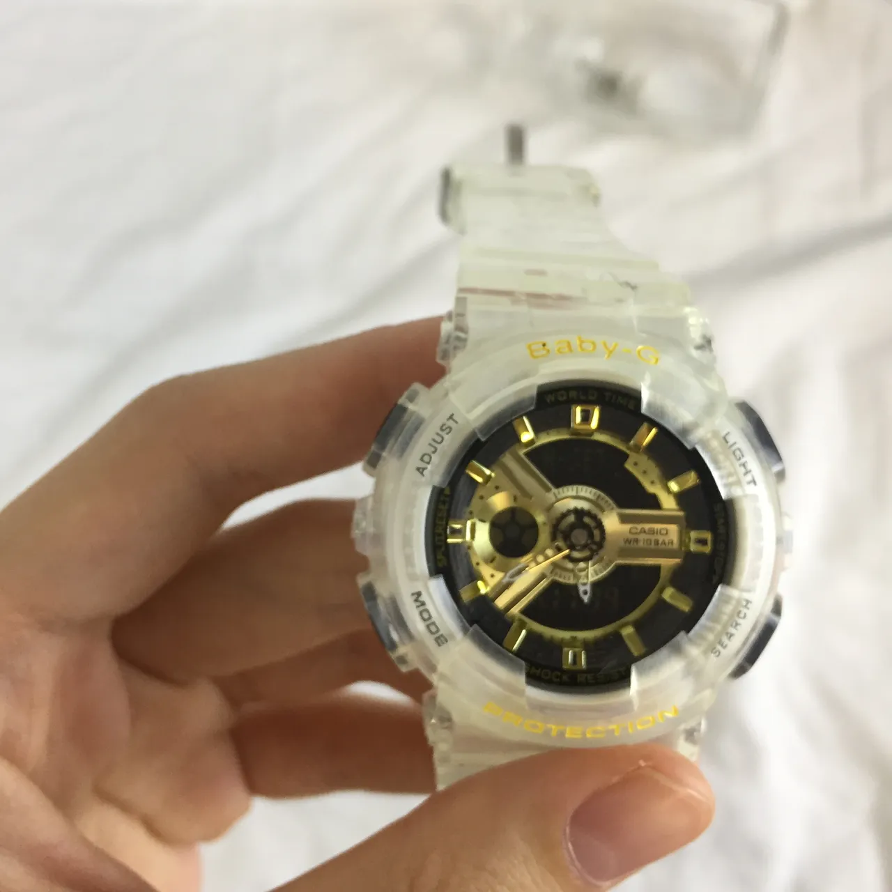 Casio Baby-G GA-110 Montre avec Boîtier en Résine Transparente Dorée avec Accents sur le Cadran 5