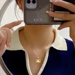 Chanel Interlocking CC Logo Gold Tone Pendant Necklace