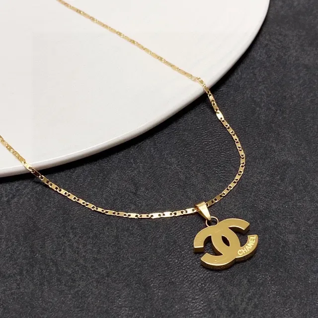 Chanel Interlocking CC Logo Collier pendentif ton doré 5