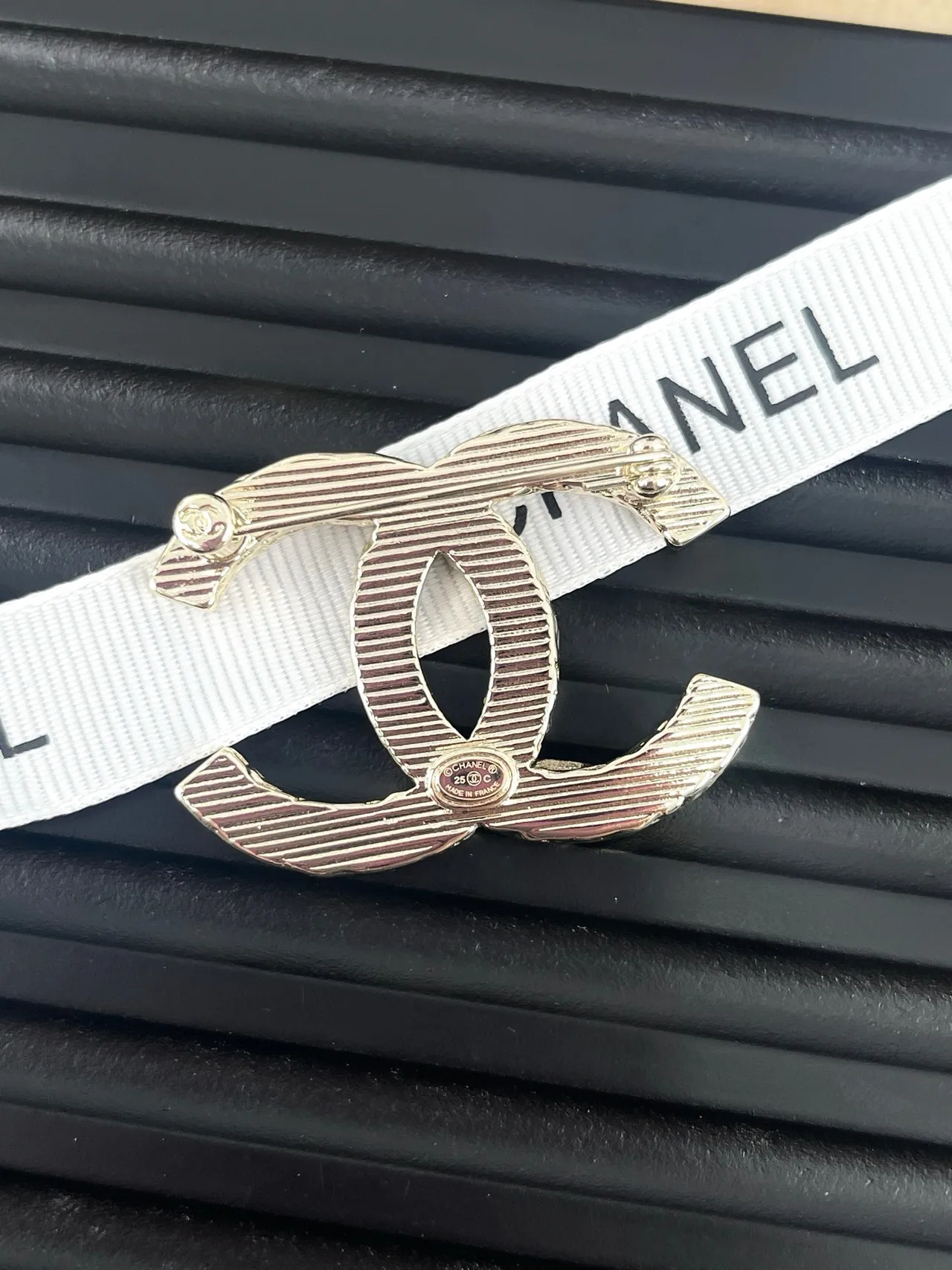 Chanel Silver Black Textured Relief Interlocking CC Motif Brooch 2