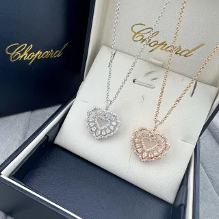 Collier Chopard argent et or en forme de cœur ajouré avec pierres en forme de poire et ronde