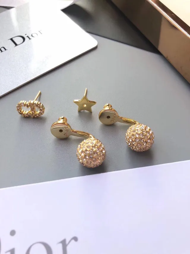 Dior Bobby and Rose des Vents boucles d'oreilles dorées pavées de cristaux 3