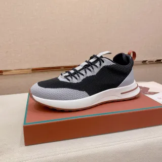 Tênis pretos e cinza com upper de knit e mesh, midsole branco esculpido