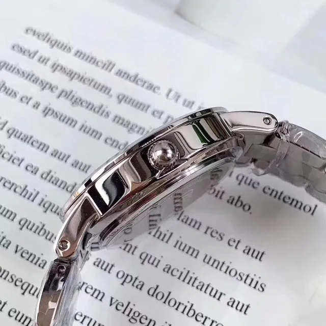 Daniel Wellington Montre de Quartz en Acier Inoxydable avec Cadran Noir Classique 6