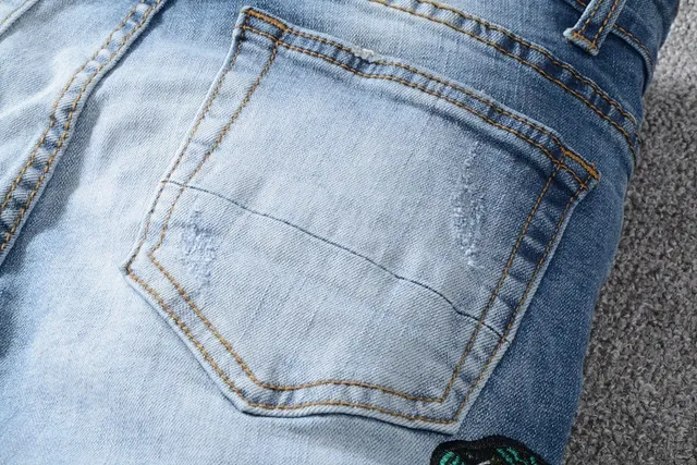 Distressed Light-Wash Blue Embroidered Snake Slim-Fit Jeans 4