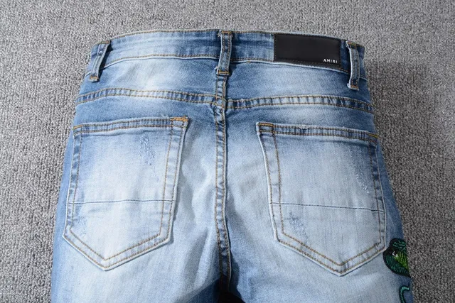 Distressed Light-Wash Blue Embroidered Snake Slim-Fit Jeans 5