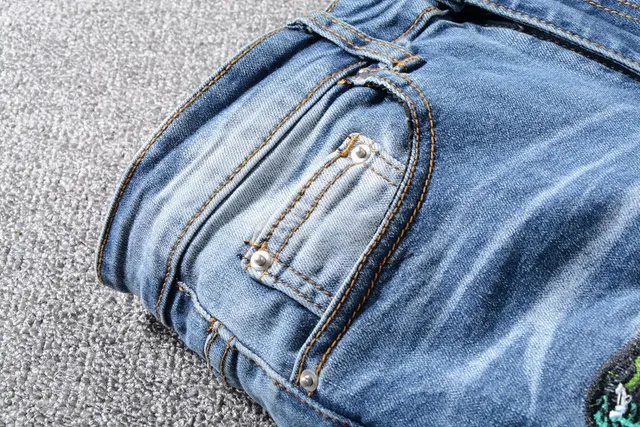 Distressed Light-Wash Blue Embroidered Snake Slim-Fit Jeans 7