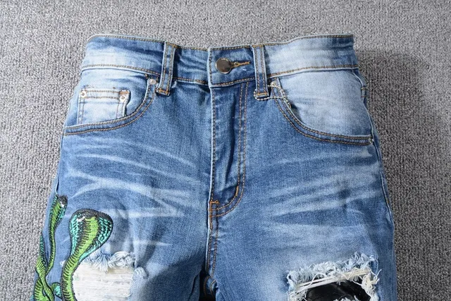 Distressed Light-Wash Blue Embroidered Snake Slim-Fit Jeans 11