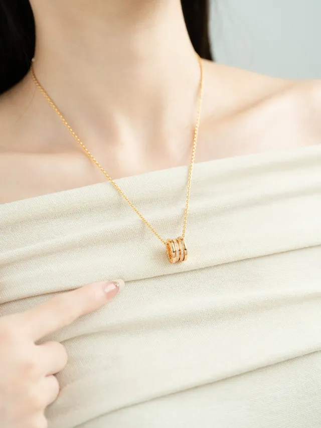 Gold and Silver Tone Multi-Ring Pavé Pendant Necklaces 4