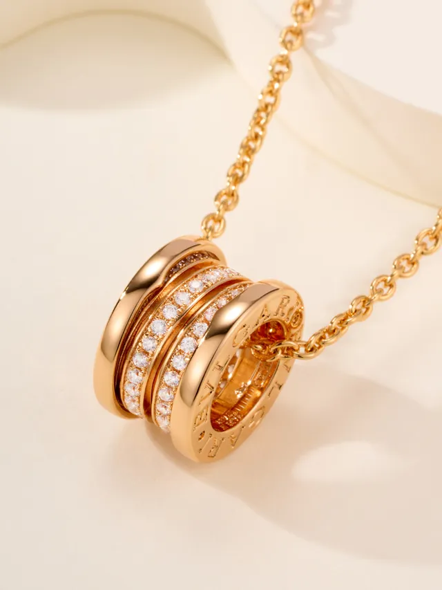 Gold and Silver Tone Multi-Ring Pavé Pendant Necklaces 13
