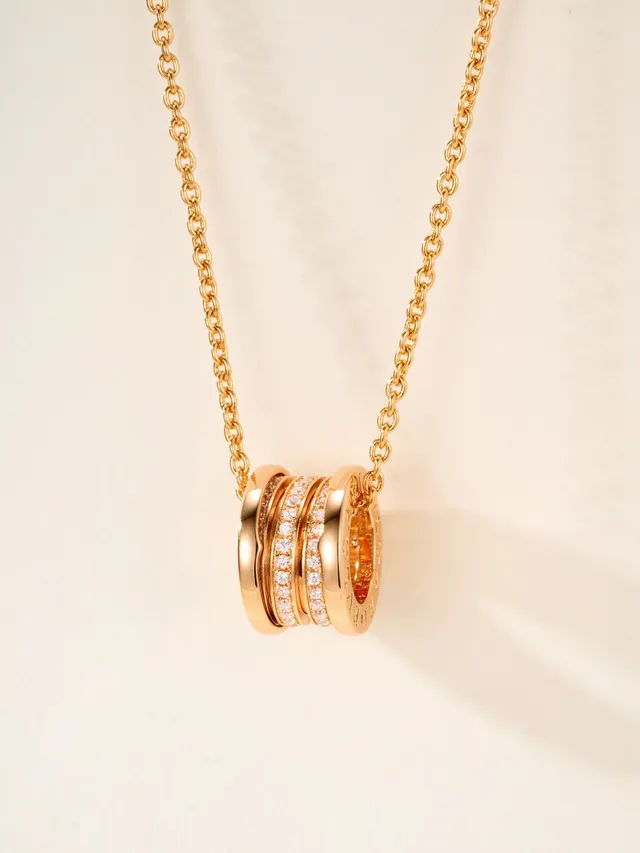 Gold and Silver Tone Multi-Ring Pavé Pendant Necklaces 16