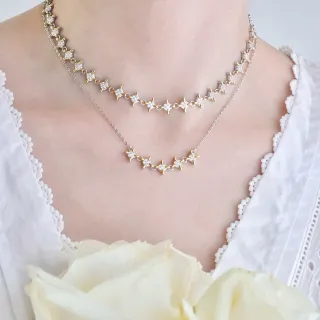 Collier en couches d'or et argent avec motif étoile