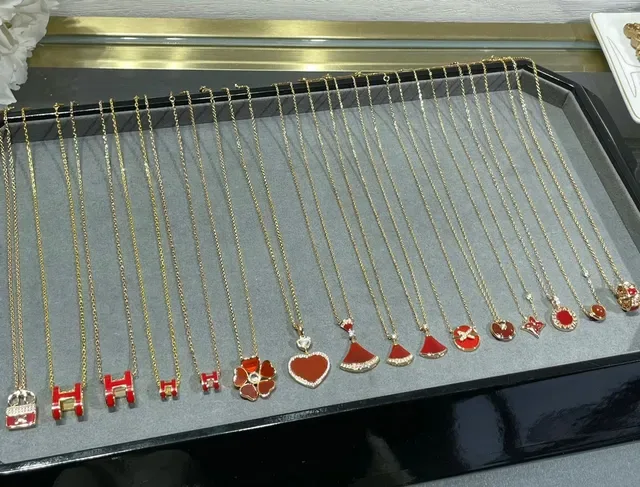 Gold-Tone Red Enamel Heart and Clover Motif Dangling Earrings 10