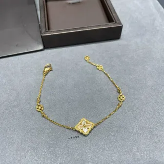 Pulsera de cadena dorada blanca con motivo floral