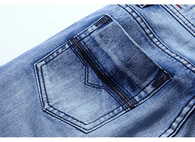 Medium-Wash Distressed Denim Shorts 5