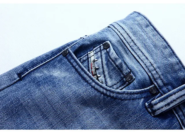 Medium-Wash Distressed Denim Shorts 6