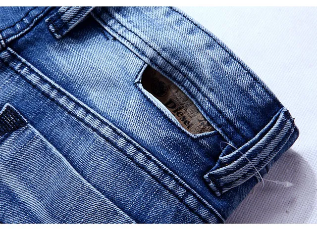 Medium-Wash Distressed Denim Shorts 7