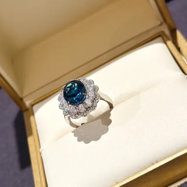 Oval Blue Gemstone Floral Halo Ring 8