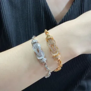 Pulseras de tono plata y oro con motivo de nudo pavé-set