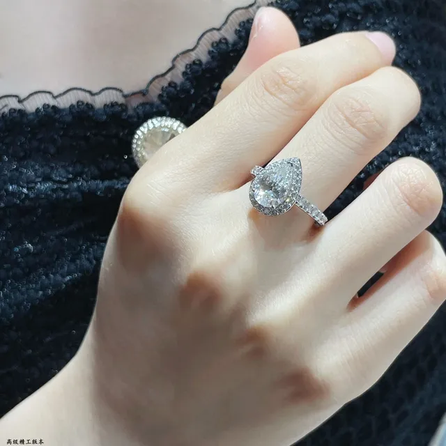 Pear-Cut Double Halo Pavé Diamond Ring 9